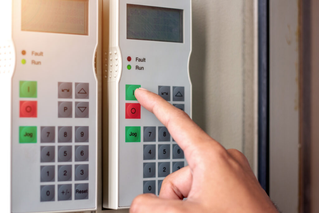 stock-photo-finger-pressing-button-variable-speed-drive-inverter-used-in-factories-1507879973