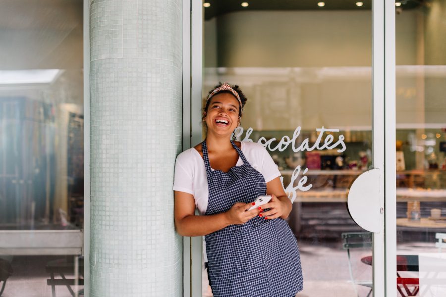 Successful,Cafe,Owner,,A,Young,Woman,,Stands,In,Her,Restaurant