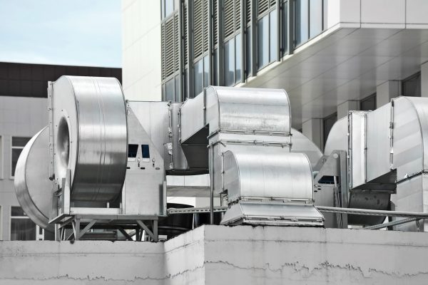 stock-photo-industrial-air-conditioning-and-ventilation-systems-on-a-roof-359029724