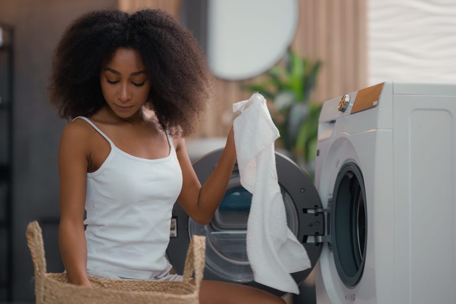 stock-photo-african-american-ethnic-woman-girl-wife-housewife-householder-homeowner-busy-with-housework-2474810573