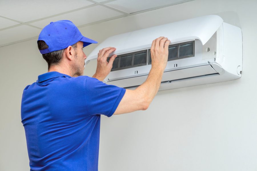 stock-photo-hvac-technician-performing-air-conditioner-maintenance-inspection-hours-emergency-breakdowns-2488702851