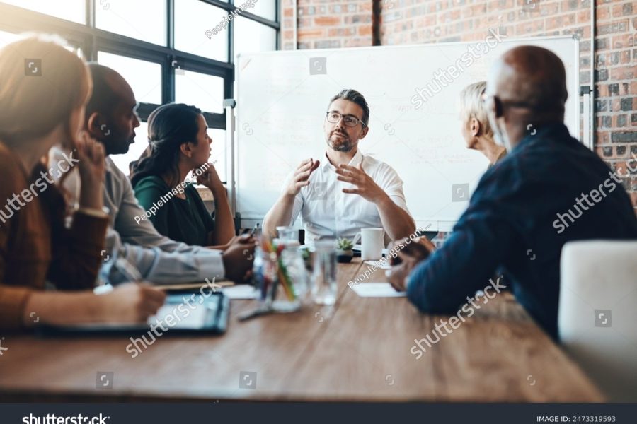 stock-photo-man-manager-and-meeting-or-presentation-in-boardroom-with-coworkers-for-corporate-business-seminar-2473319593