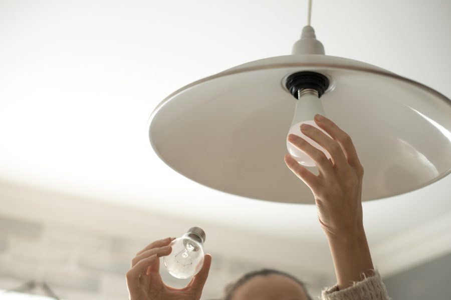 stock-photo-power-save-led-lamp-changing-539802514