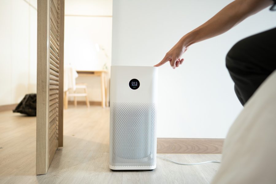 stock-photo-press-start-button-on-air-purifier-turning-on-an-air-purifier-enhance-your-indoor-air-quality-with-2506618993